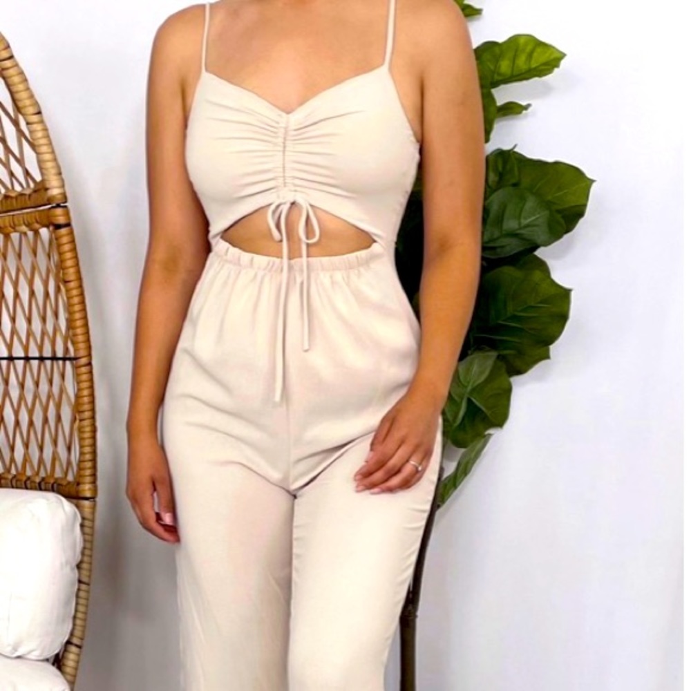 Cream jumpsuit with open front